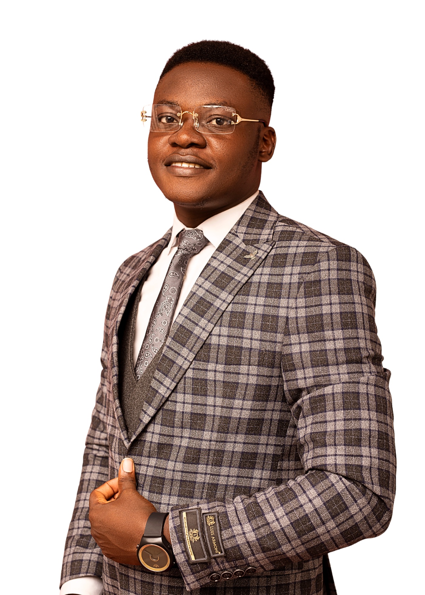 Portrait of Chinedu Okeke in a checked suit
